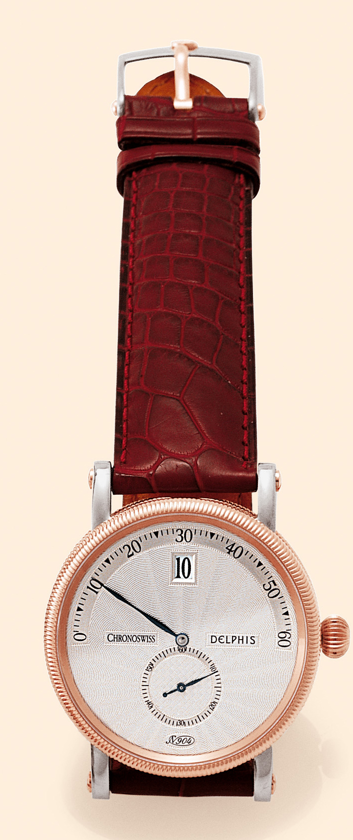 "Delphis"  Chronoswiss, "Delphis", Ref. CH 1422. Made circa 2000. Fine and unusual, self-winding, water-resistant, stainless steel and 18K pink gold gentleman's wristwatch with jump-hour and retrograde minute indication and a stainless steel and 18K pink gold Chronoswiss buckle.