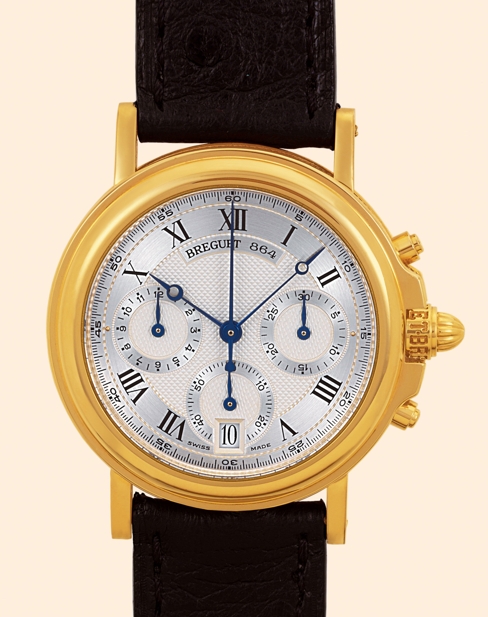 "12-Hour Chronograph "
Breguet, Horloger de la Marine, "Chronographe Automatique" ,
No . 864C . Made in 1992 .
Very fine, heavy, self-winding, water-resistant to 50 meters, 18K yellow gold gentleman's
wristwatch with round button chronograph, registers, date and an 18K yellow
gold Breguet deployant clasp, box, and certificate .