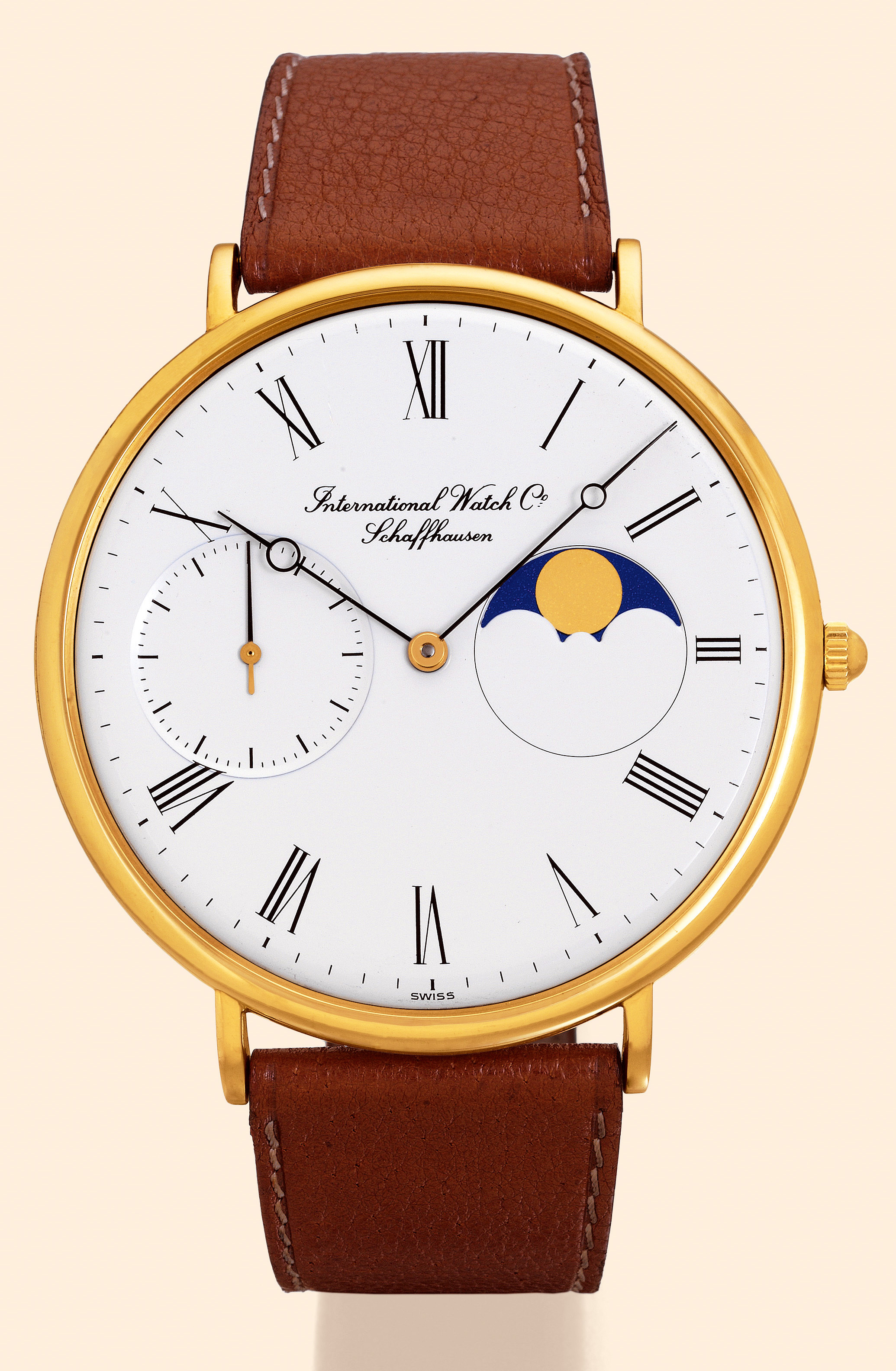 ?Moon Phases?  International Watch Co., Schaffhausen, No. 2317908, case No.2423353. Made in the 1980s. Fine, oversized astronomic 18K yellow gold gentleman?s wristwatch with moon phases. Accompanied by a box and guarantee.