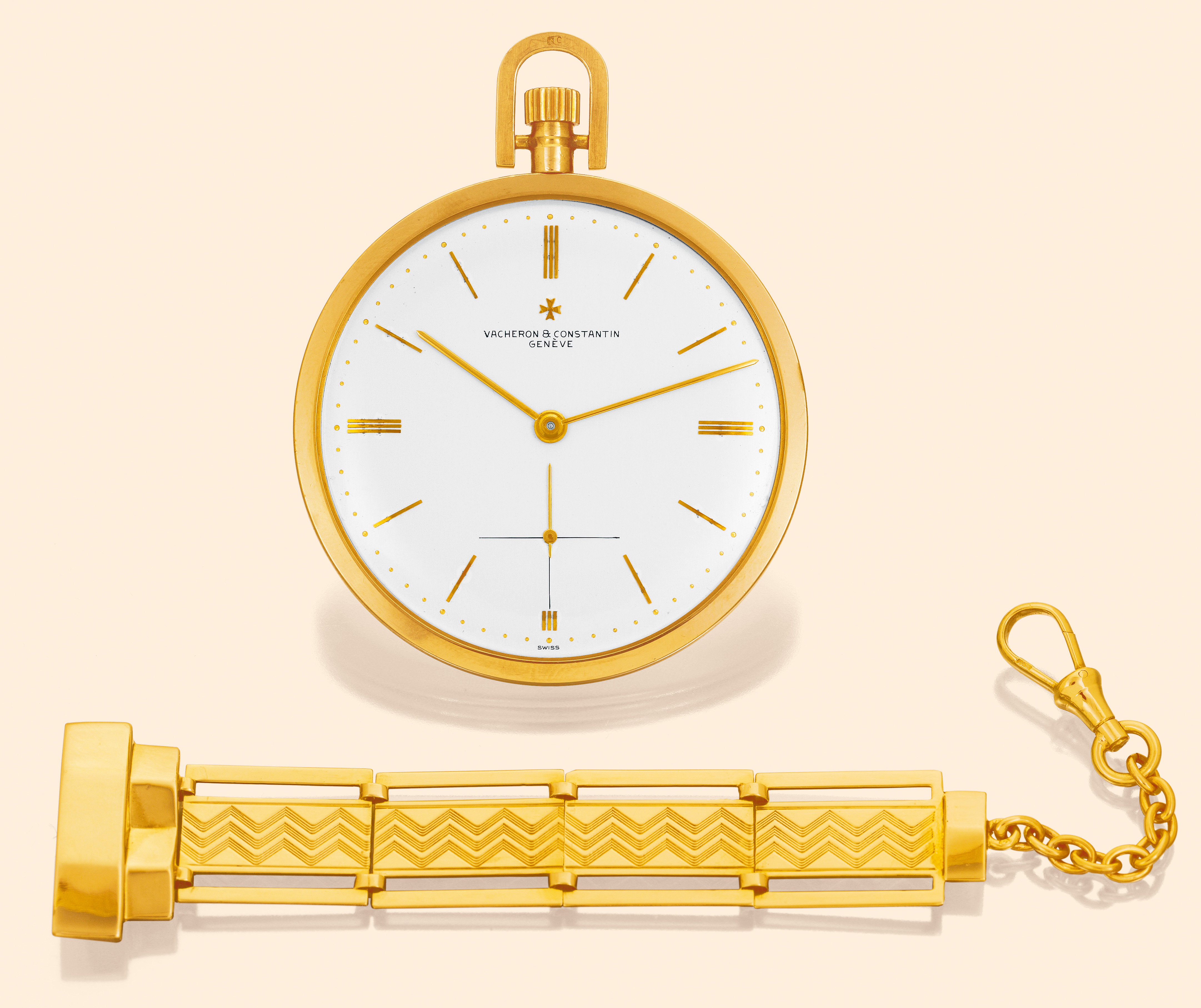 Vacheron & Constantin, Genève, No. 494118, case No. 353877, Ref. 4060. Made in 1957. Very fine and elegant keyless 18K yellow gold dress watch with fob.