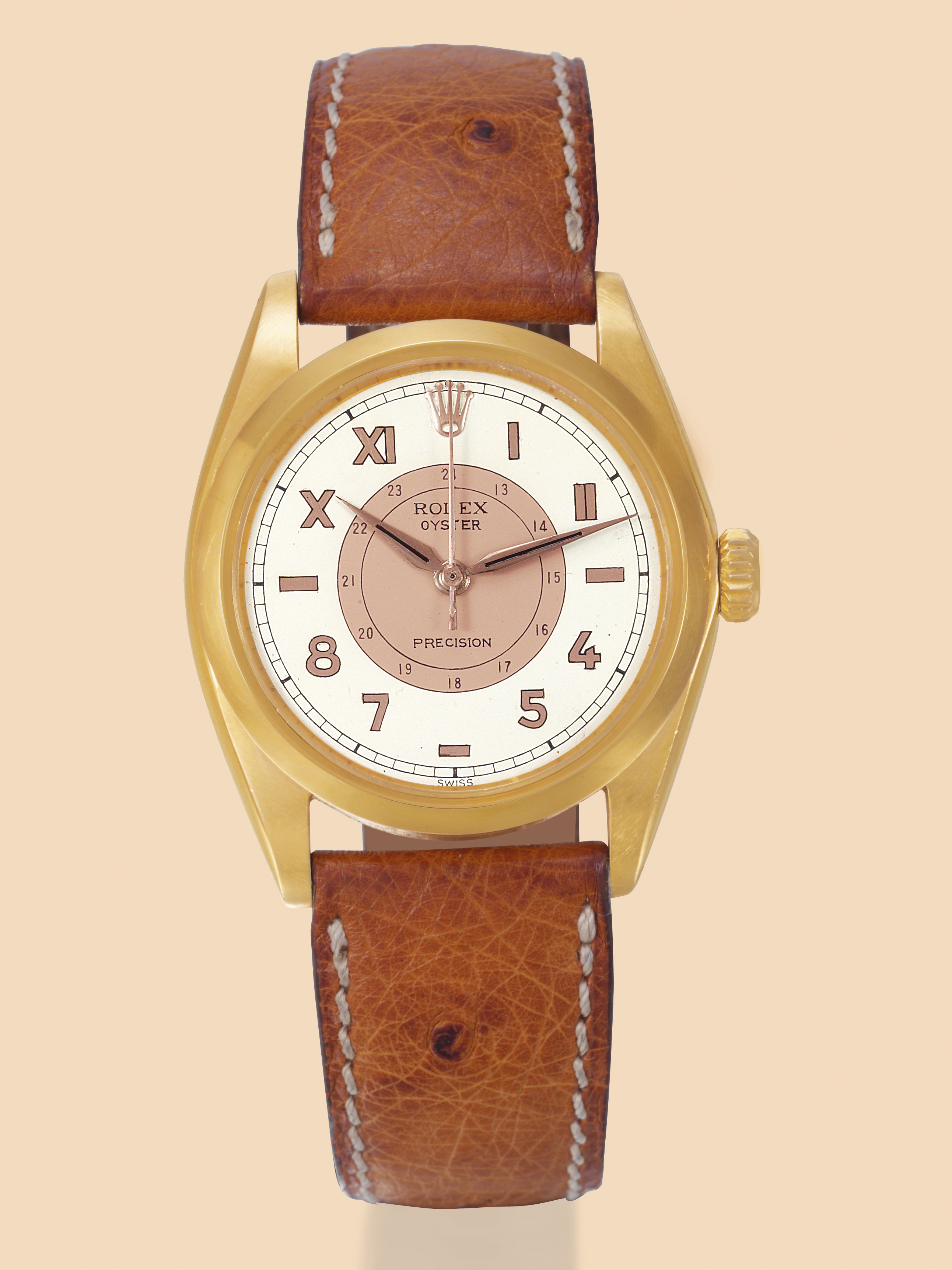 Ref. 6426, ?Precision, Mixed Index Dial?
Rolex, ?Oyster, Precision?, Ref. 6426, case
No. 682904. Made in 1950.
Fine, thin, center seconds, water-resistant, gold-plated and
steel gentleman`s wristwatch with 24-hour ?Mixed Index?
dial.