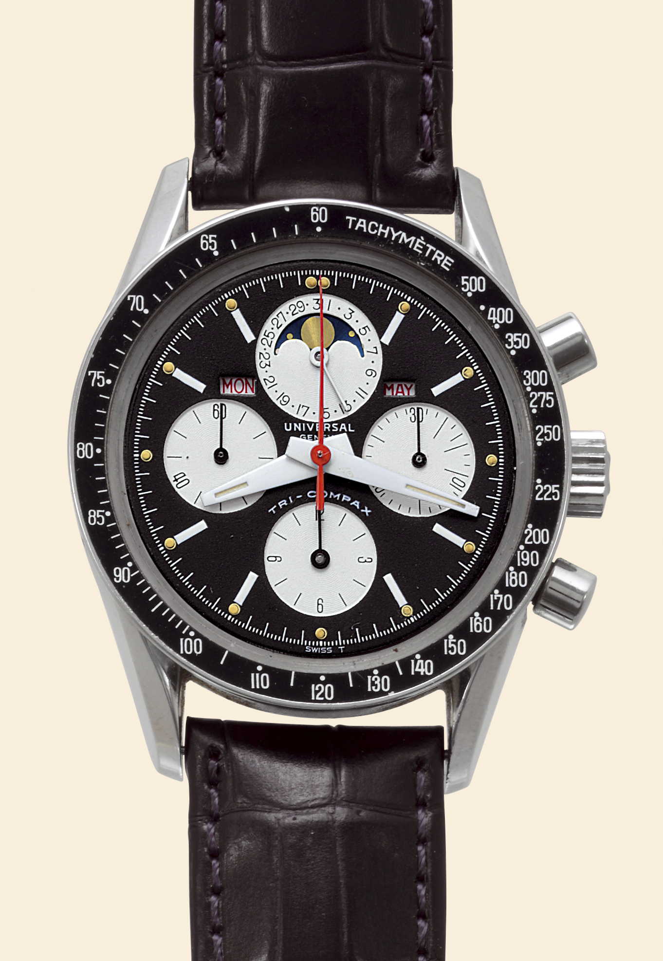 Stainless
?Tri-Compax?
Universal, Genève,
"Tri-Compax". Made in the 1960s.
Very fine, astronomic, stainless steel,
water-resistant, gentleman's wristwatch
with round button chronograph, registers,
tachometer bezel, triple date and moon phases.