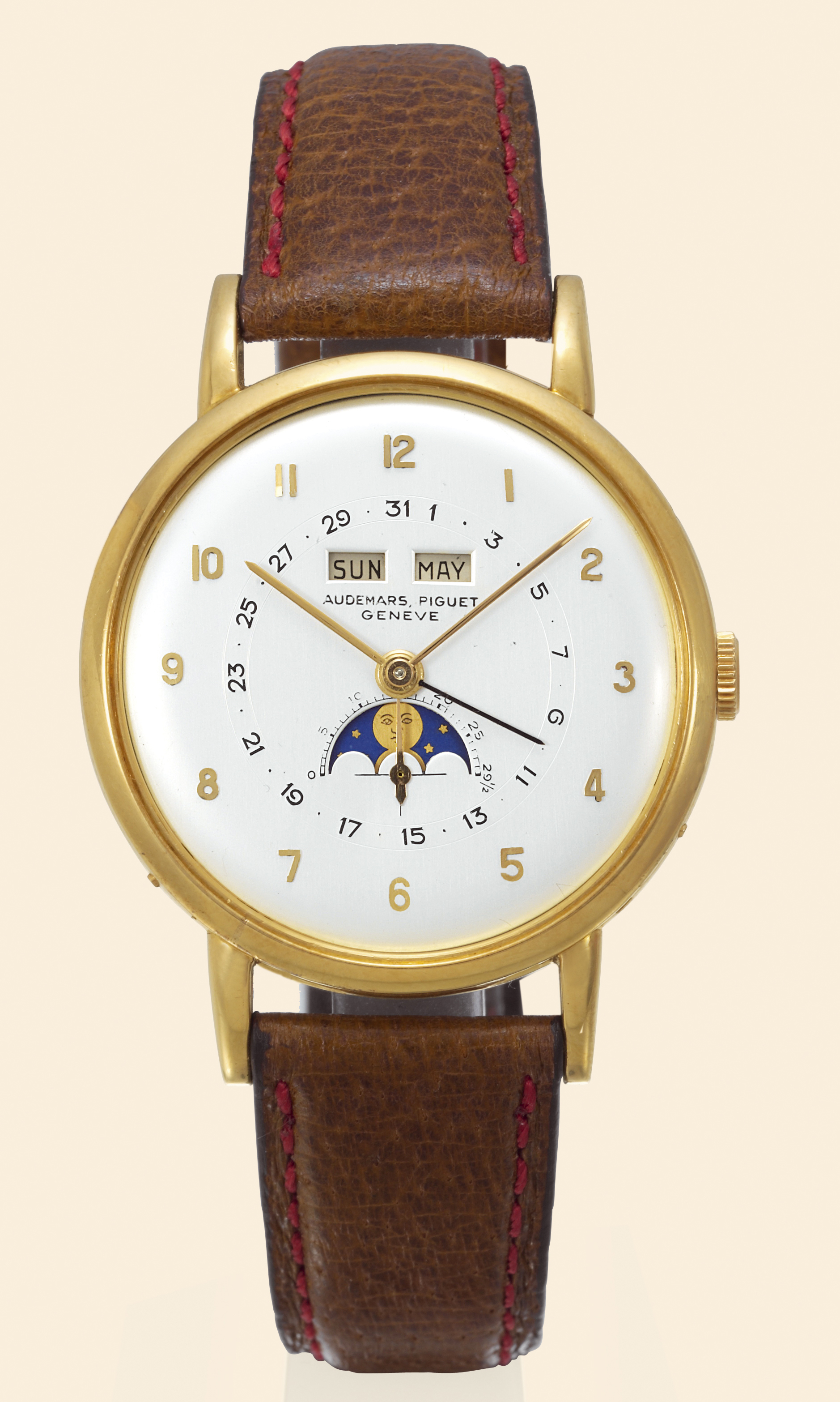 Audemars Piguet, Genève, No. 54807, case No. 54807. Made circa 1948.
Very fine and rare, astronomic, 18K yellow gold gentleman's wristwatch with triple date,
moon phases and age of the moon.