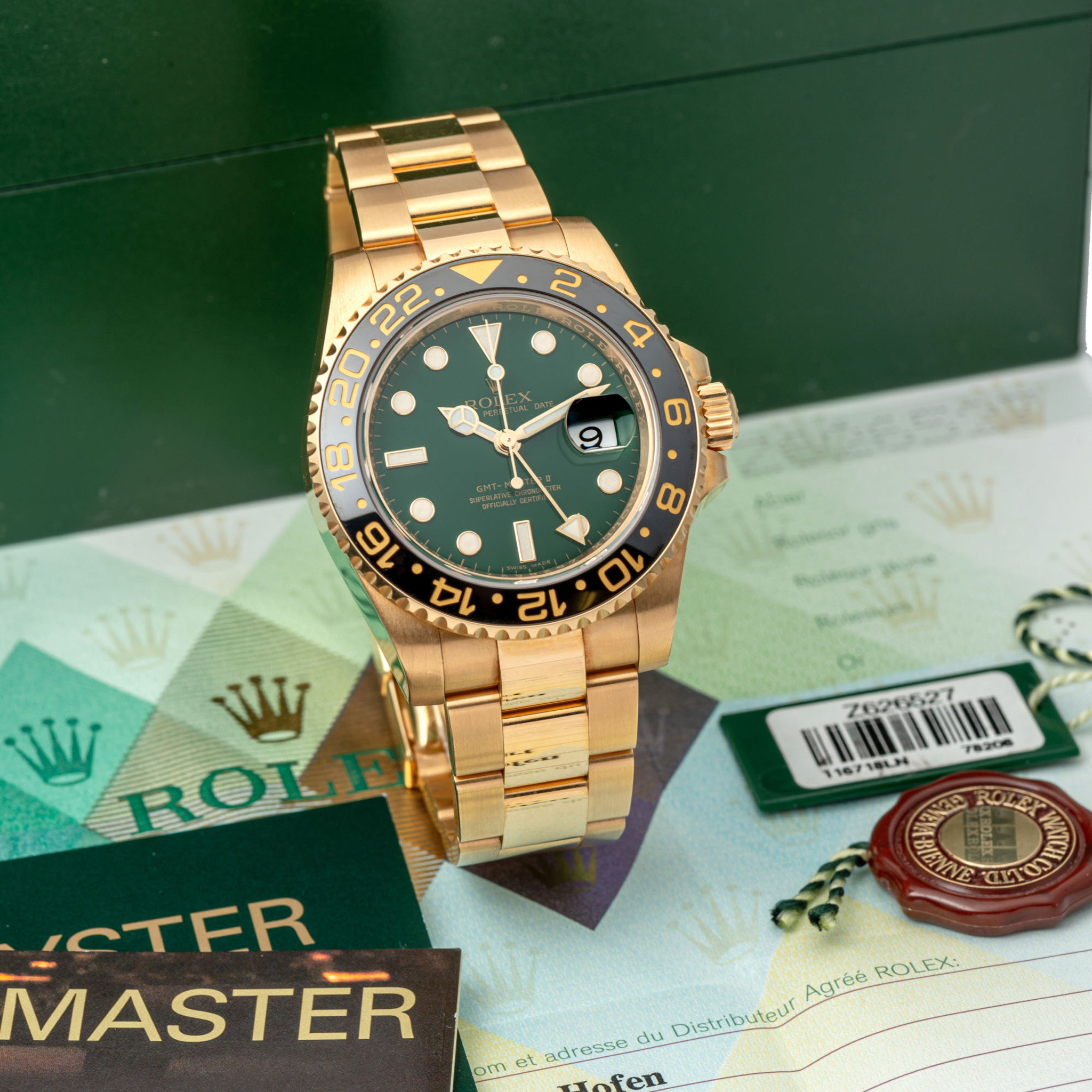 ROLEX, REF. 116718, GMT-MASTER II, GREEN DIAL, YELLOW GOLD