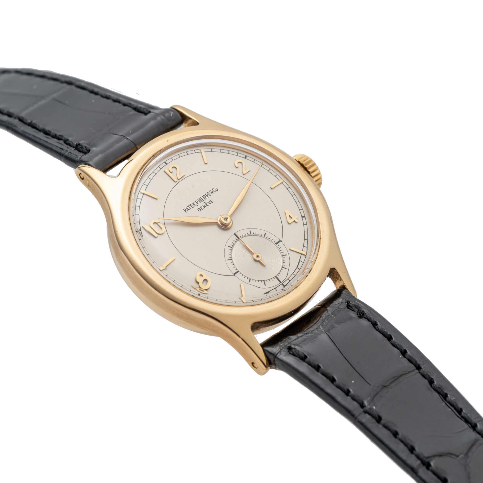 PATEK PHILIPPE, REF. 565, ARABIC NUMERALS, YELLOW GOLD