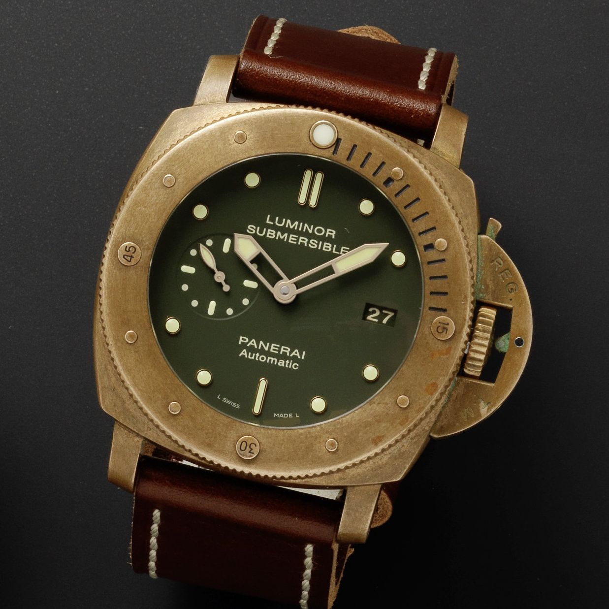 Officine Panerai. A rare bronze finish automatic calendar wristwatch with three day power reserve Luminor Submersible 1950 Bronze, Ref:PAM00382, No.932/1000, Sold 22nd February 2012