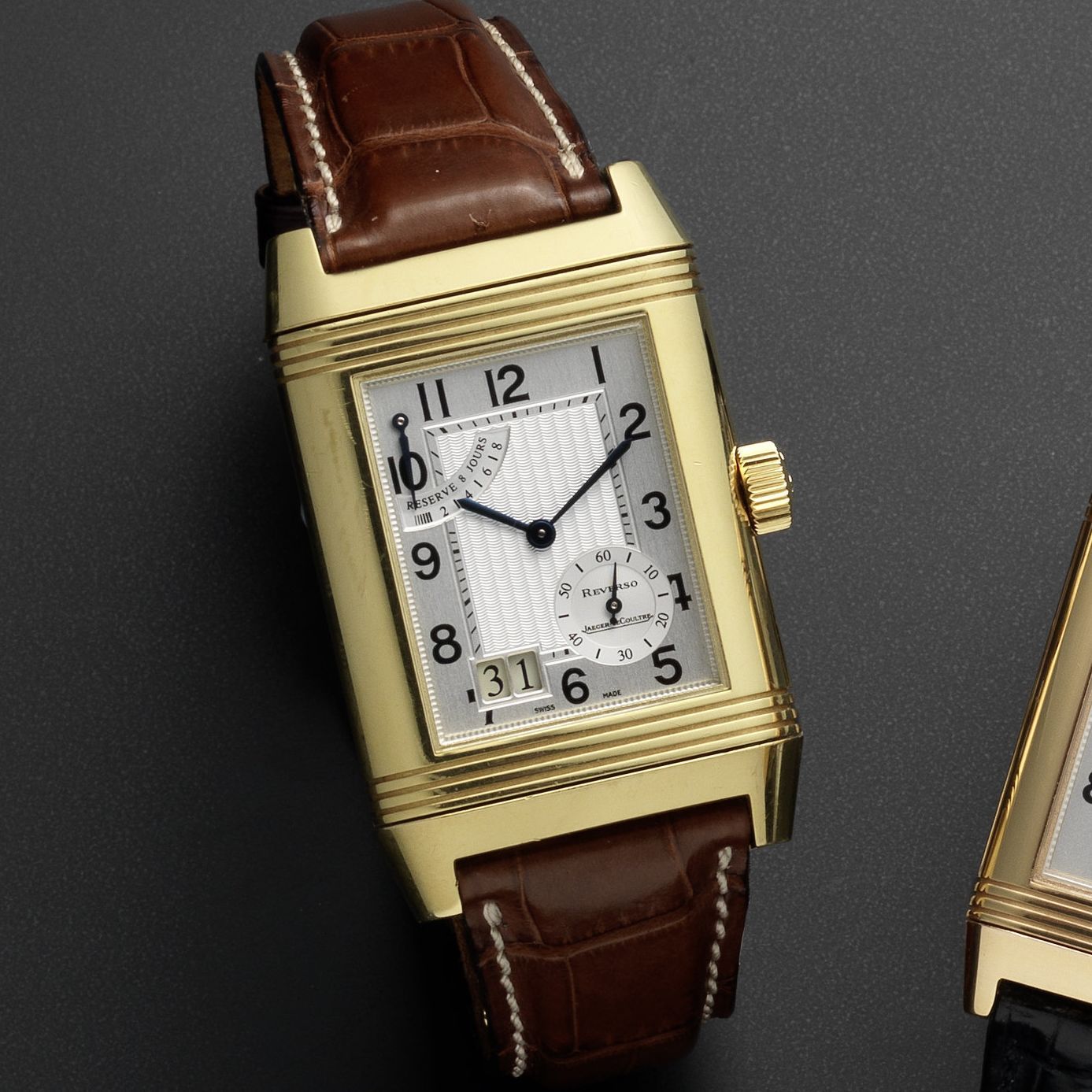 Jaeger-LeCoultre. An 18ct gold manual wind reversible calendar wristwatch with 8-day power reserve Reverso Grande Date, Ref:240.1.15, No.069/500, Case No.221508, Circa 2005