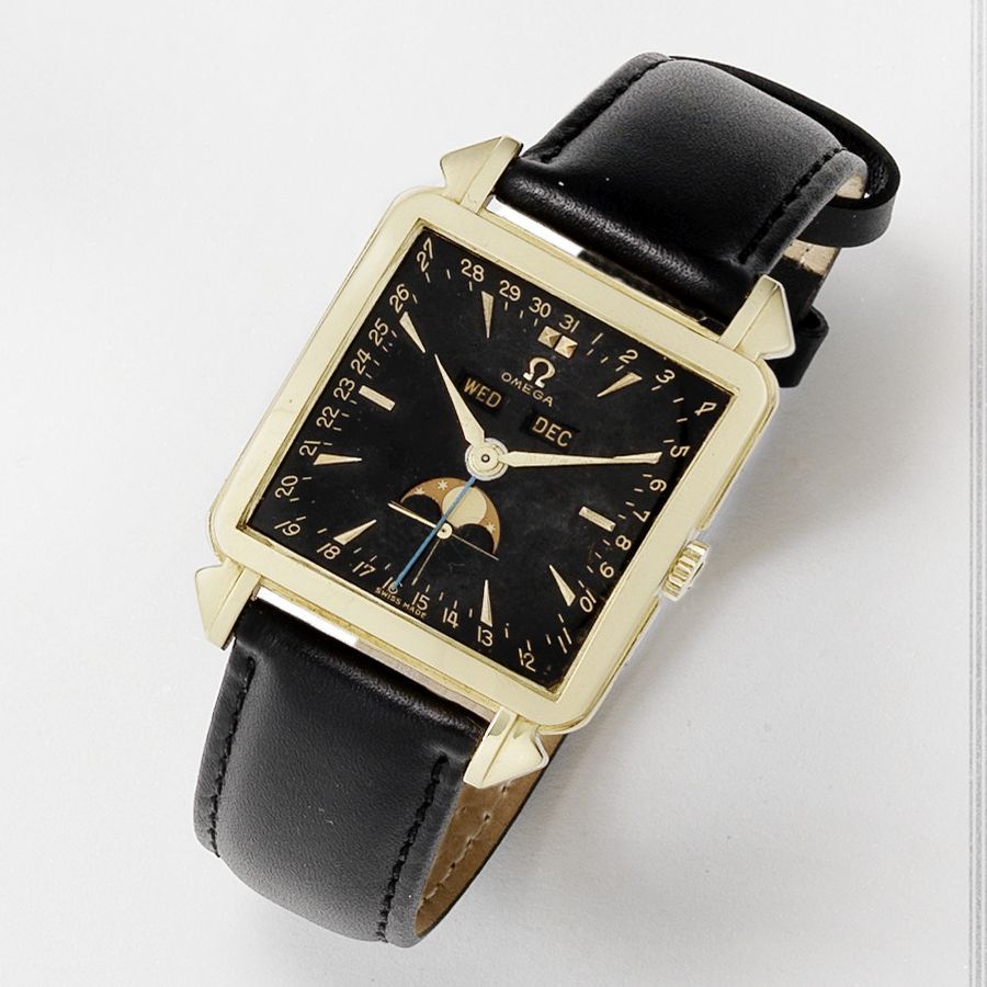Omega. A fine and rare 18k gold manual wind calendar wristwatch with moon phase Cosmic, Ref:3944, Case No.11116899, Movement No.12878669, Produced 24th February 1954