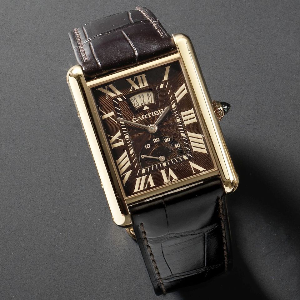 Cartier. A rectangular 18K rose gold manual wind calendar wristwatch with power reserve Tank, Ref:3185, Case No.99326QX, Sold March 2011