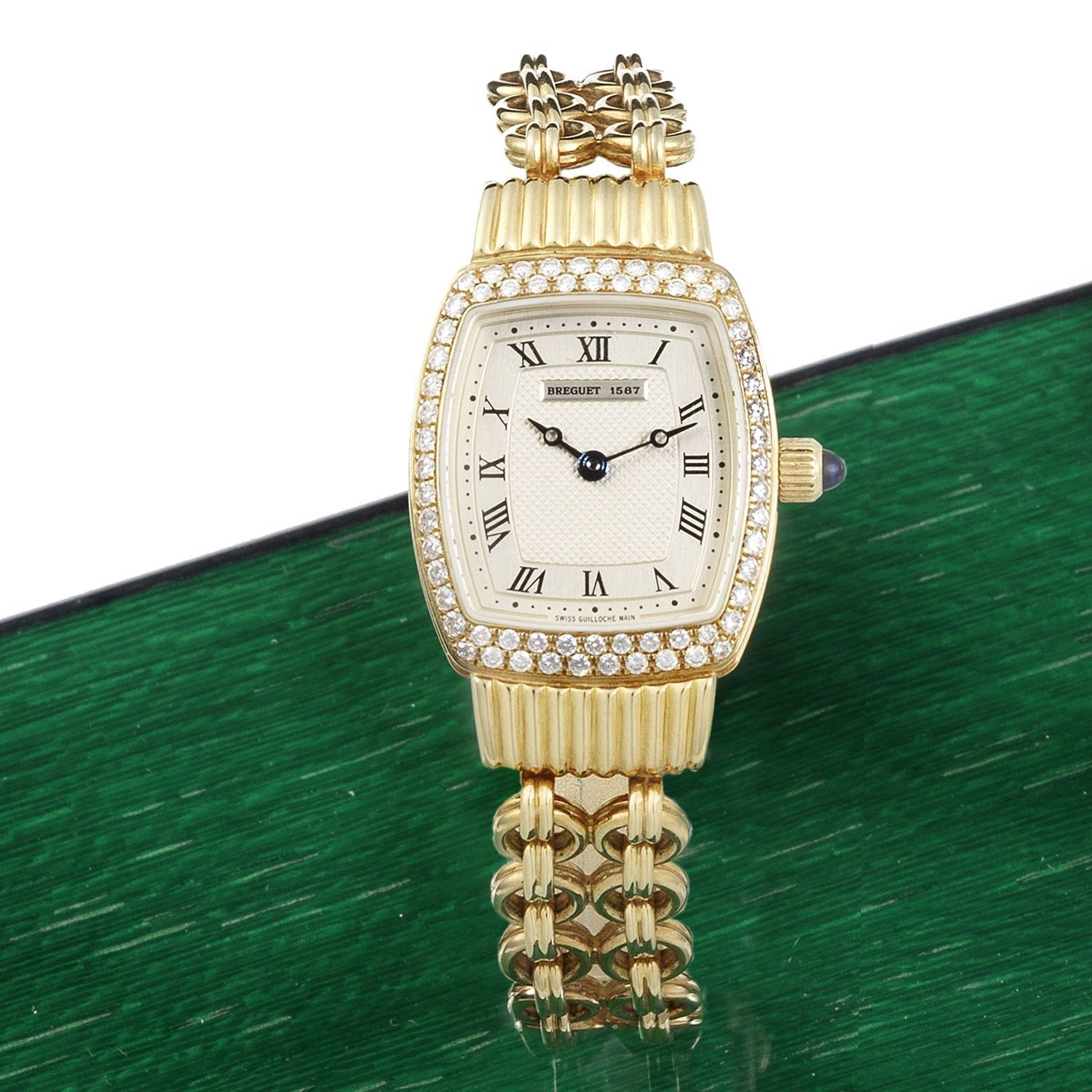 Breguet. A lady's 18K gold and diamond set manual wind bracelet watch Ref:1587 G, Sold 24th June 1996