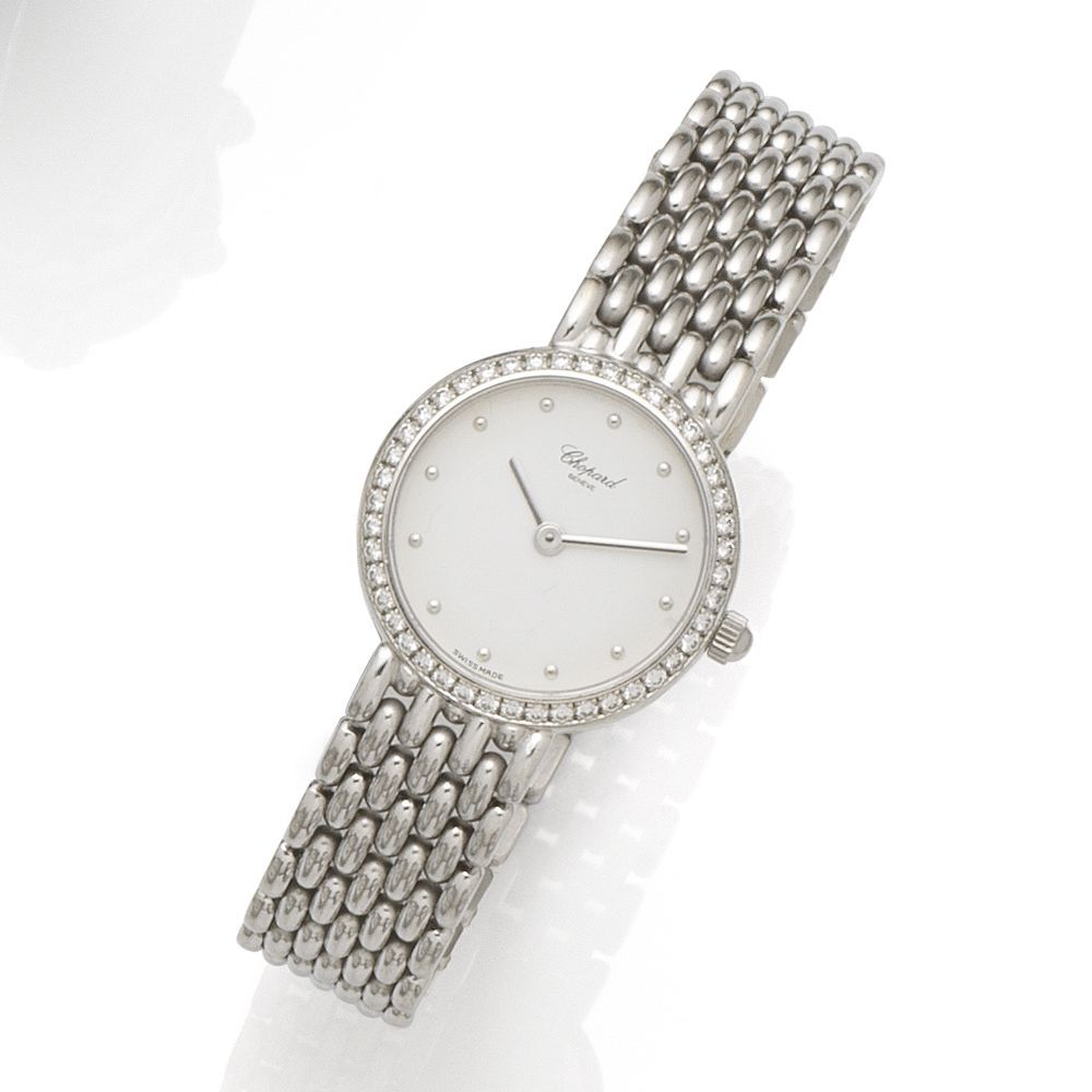Chopard. A lady's 18K gold and diamond set quartz bracelet watch Ref:919, Case No.503675, Circa 1990