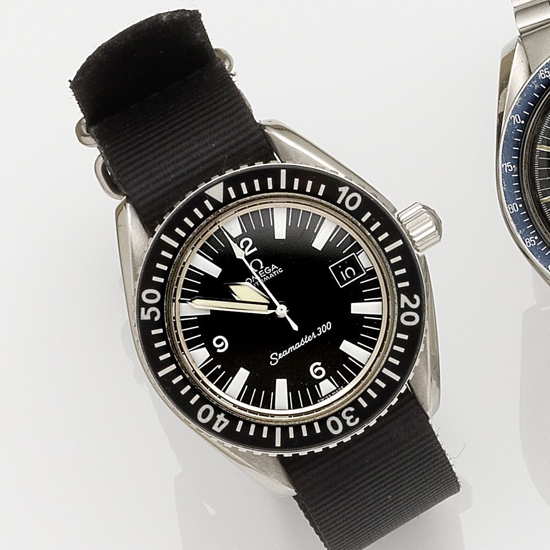 Omega. A stainless steel automatic calendar wristwatch Seamaster 300, Case No.165024, Movement No.28995798, Circa 1969
