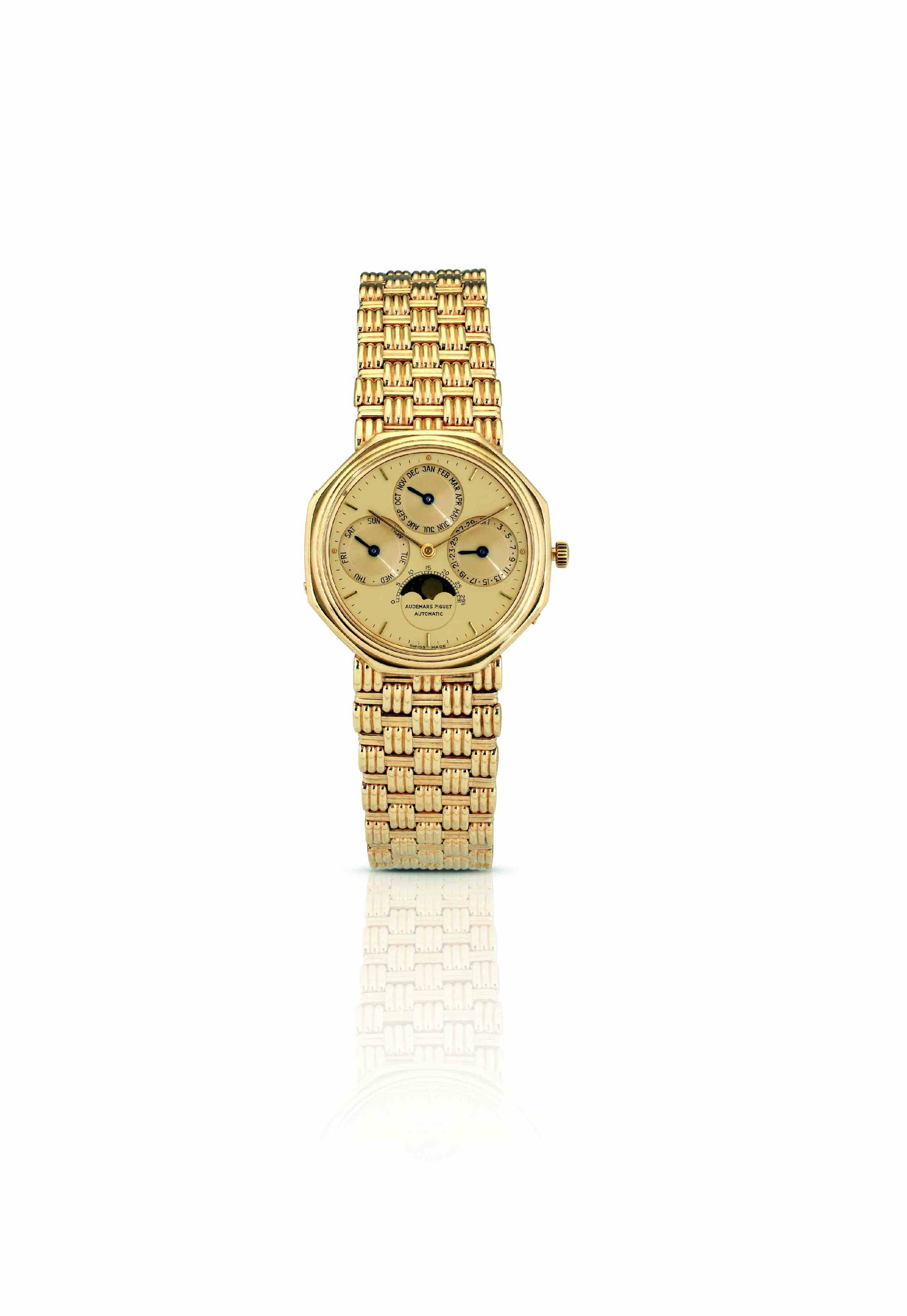 Audemars Piguet. A fine and rare 18ct gold perpetual calendar automatic bracelet watch with moon phases Quantième Perpétuel Automatique, Ref:C11382, Case No.2064, Movement No.274278, Circa ...