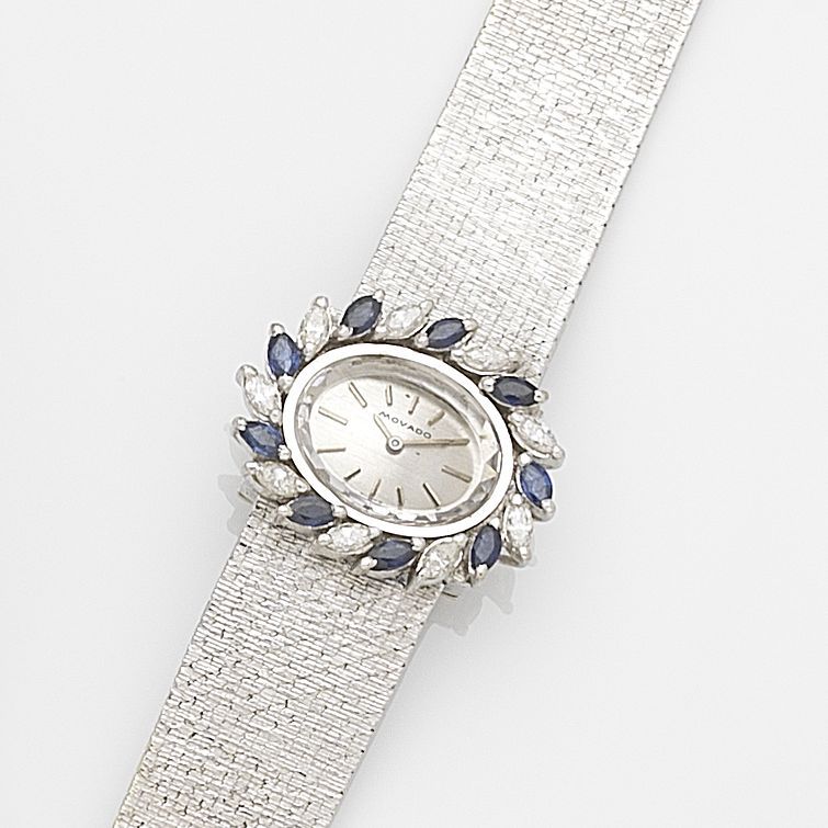 Movado. A lady's 18ct white gold, diamond and sapphire set manual wind bracelet watch Case No.110, Circa 1965