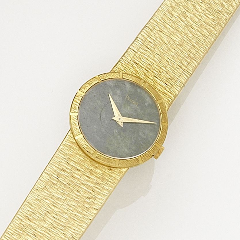 Piaget. A lady's 18K gold manual wind bracelet watch with green hard stone dial Ref:9701A6, Case No.186009, Movement No.706887, Sold 5th July 1972