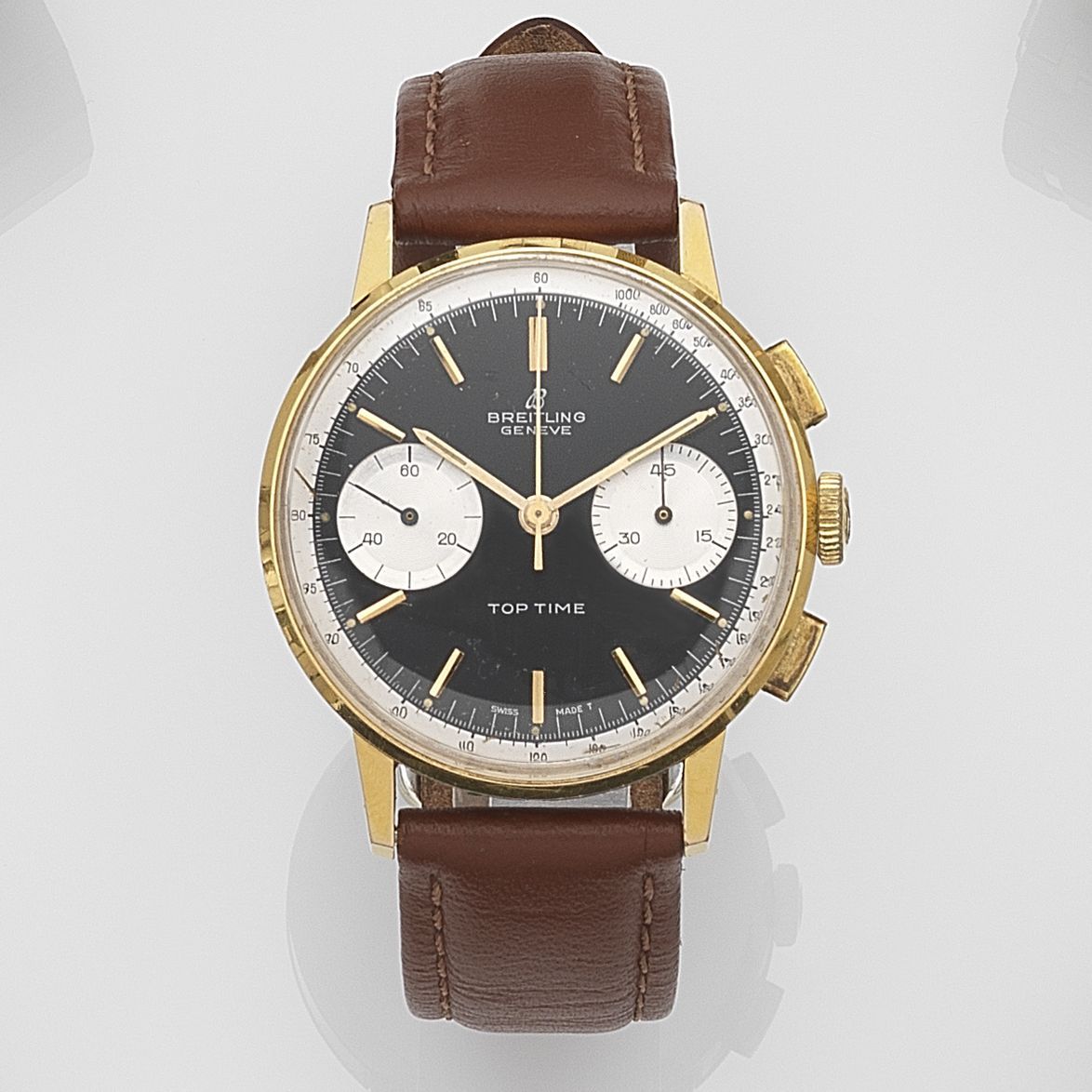 Breitling. A gold plated manual wind chronograph wristwatch Top Time, Ref:2003, Circa 1965