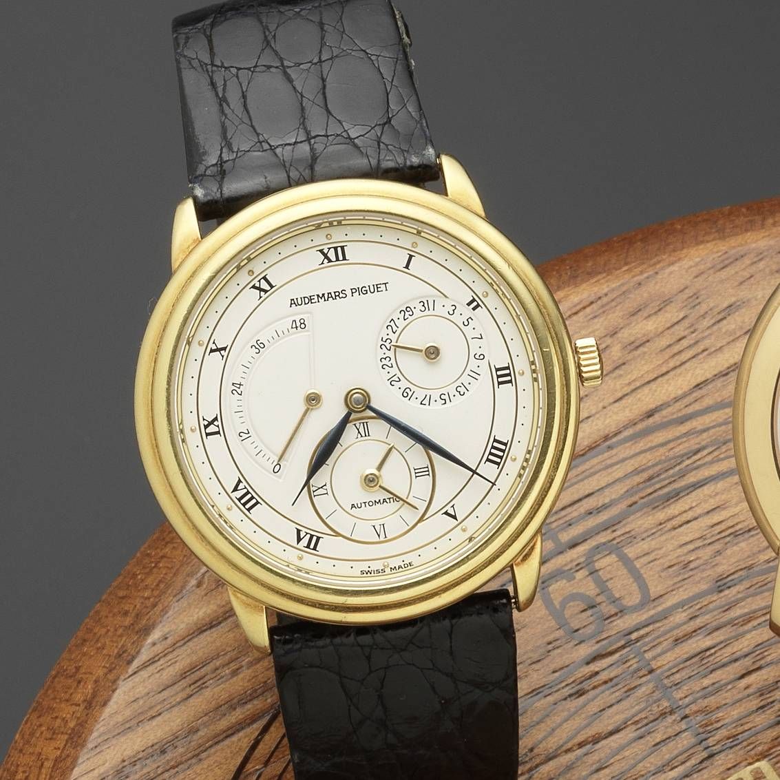Audemars Piguet. An 18ct gold automatic calendar wristwatch with dual time-zone indication 'Dual Time,' Ref:BA25685/002, Case No.99067, Movement No.349051, Sold 20th September 1991