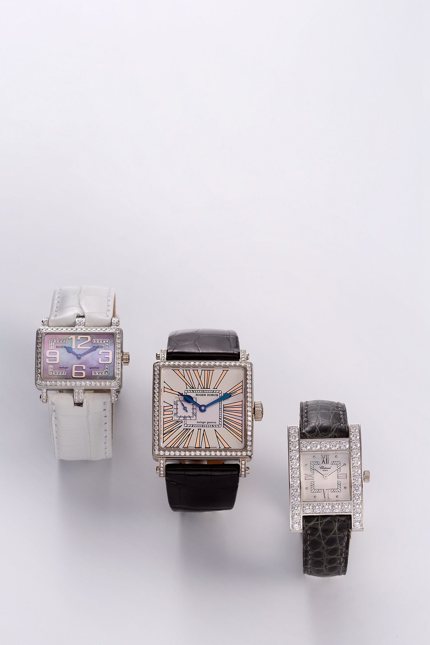 Roger Dubuis. A lady's 18K white gold and diamond set automatic wristwatch Golden Square, No.12/28, Movement No.3423, Circa 2010