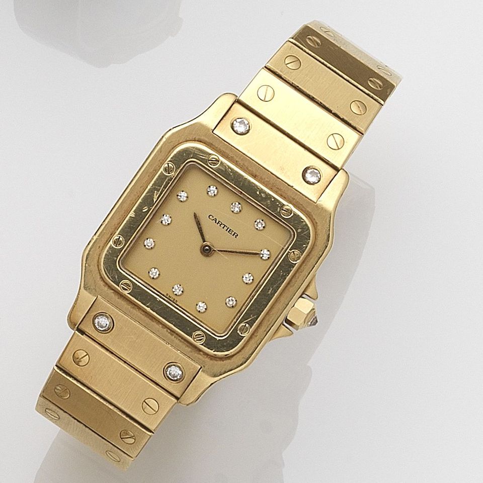 Cartier. An 18ct gold and diamond set automatic bracelet watch Santos, Case No.8296003857, Circa 1985