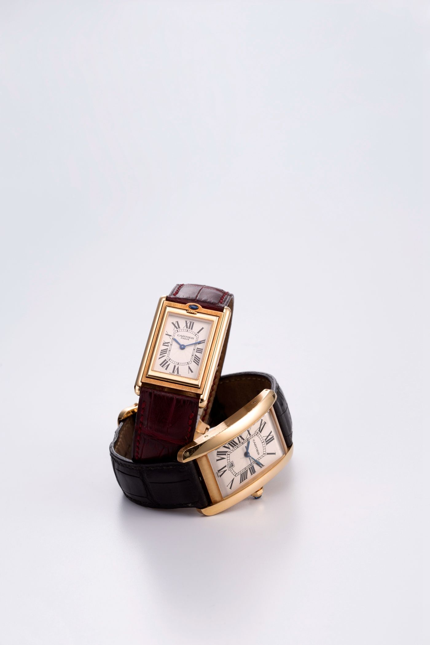 Cartier. An 18K gold automatic calendar wristwatch with box and papers Tank Américane, Ref:1740, Case No.CC803176, Sold 31st December 1999
