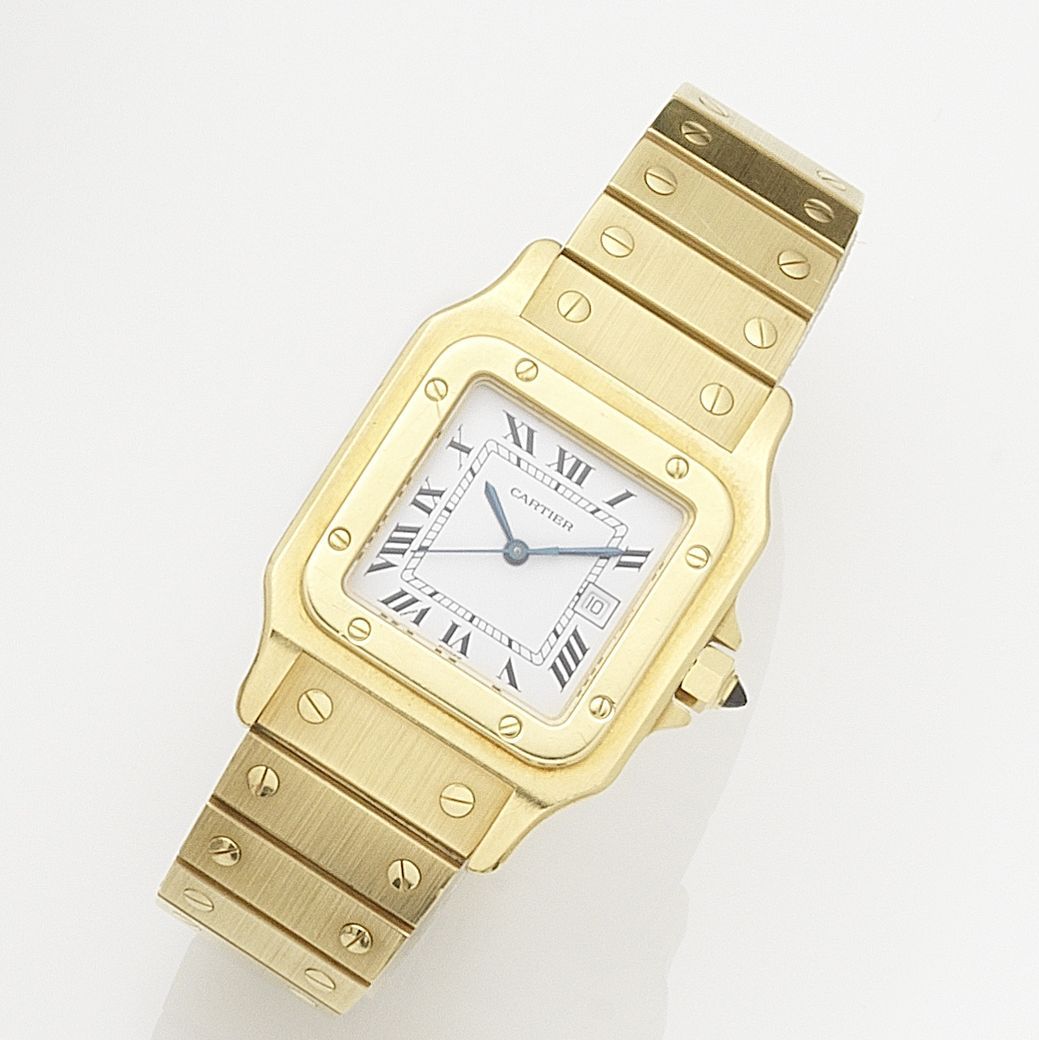 Cartier. An 18K gold automatic calendar bracelet watch together with associated cuff links Santos, Circa 1990