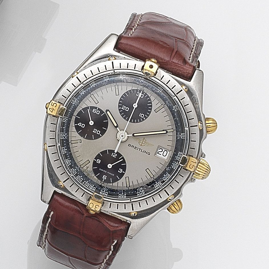 Breitling. A stainless steel and gilt automatic calendar chronograph wristwatch Chronomat, Ref:81950 A, Case No.19695, Circa 1990