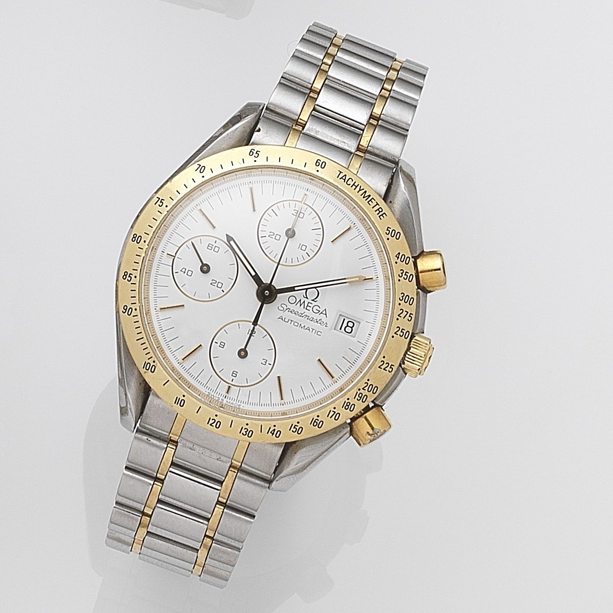 Omega. A stainless steel and gold automatic calendar chronograph bracelet watch Speedmaster, Ref:3570.50.00, Case No.77013947, Sold 5th April 2001