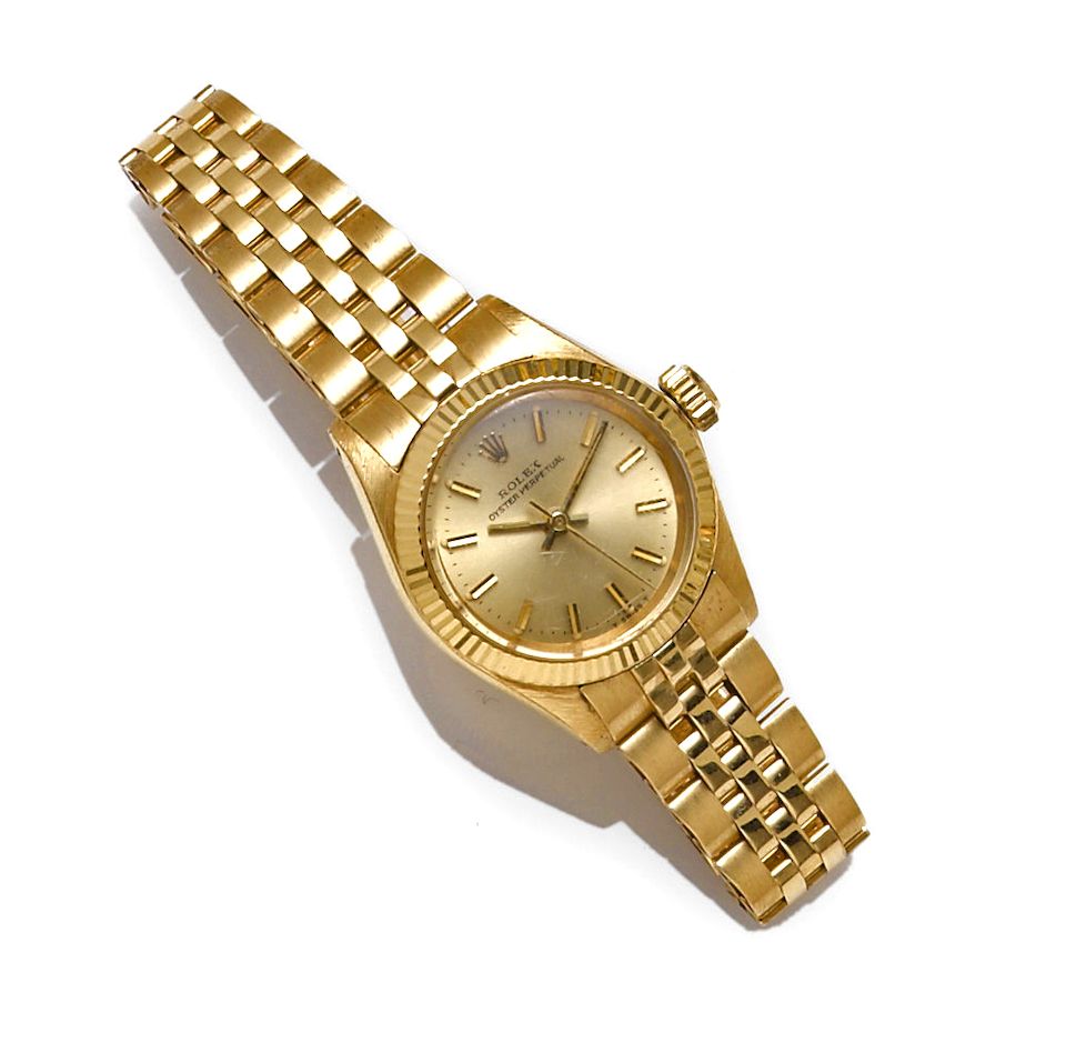 Rolex. An 18k gold ladies automatic bracelet wristwatch