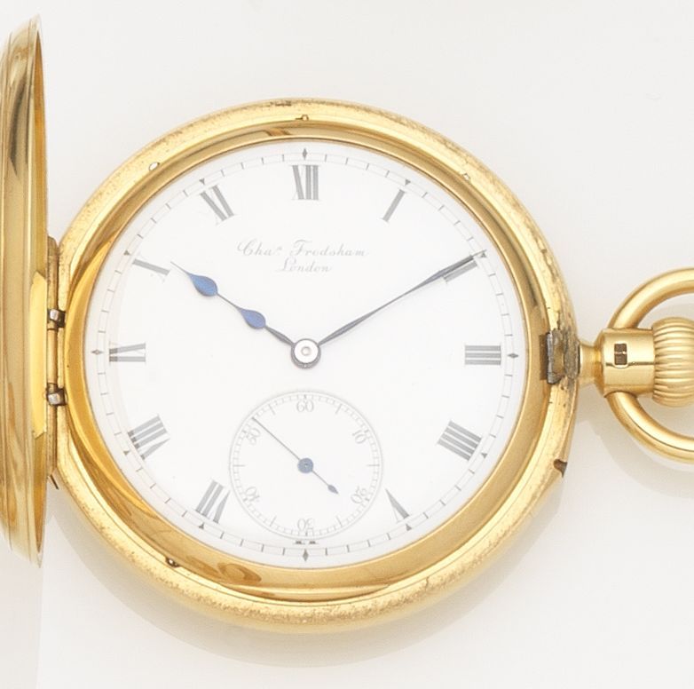 Charles Frodsham. An 18ct gold keyless wind half hunter pocket watchCase and Movement No.010113, London Hallmark for 1916