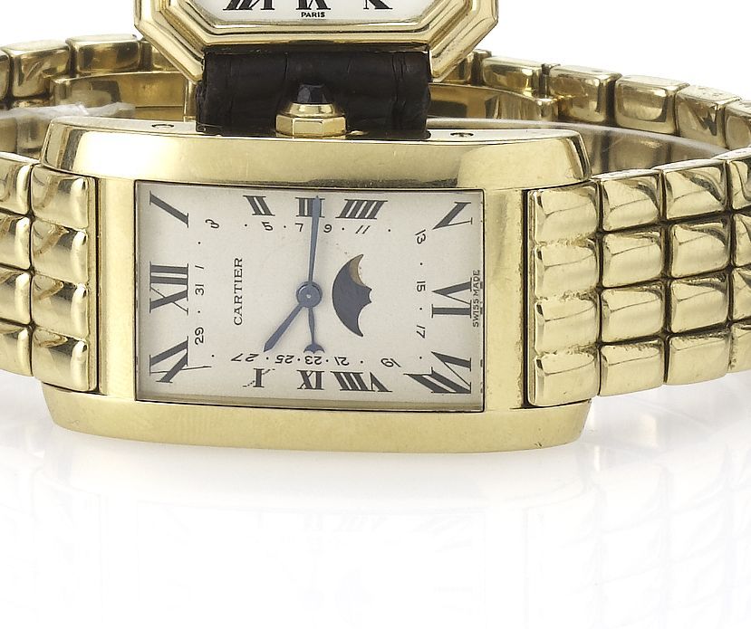 Cartier. An 18ct gold quartz calendar bracelet watch with moonphasesTank, 1980's