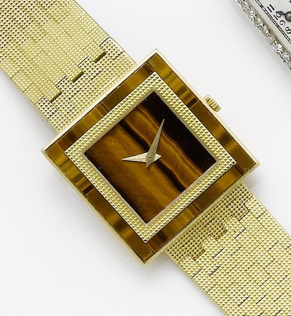 Piaget. A lady's 18ct gold and tiger eye manual wind bracelet watch