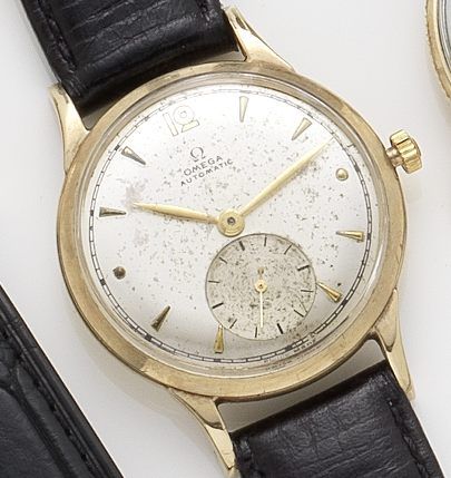 Omega. A 9ct gold automatic wristwatchAnniversary edition, Movement No. 10813294, Case No. 167944, Sold 20th October 1948