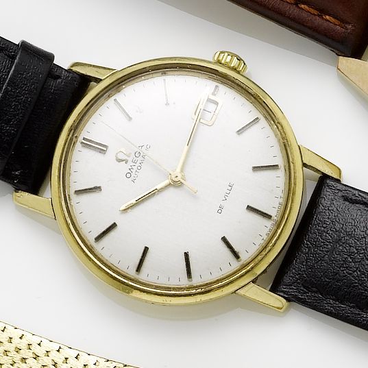 Omega. An 18ct gold automatic centre seconds calendar wristwatch