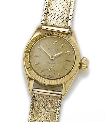 Rolex. A lady's 18ct gold manual wind watch head on unmarked braceletPrecision, Reference: 6525, Case Number: 523458, Circa 1947