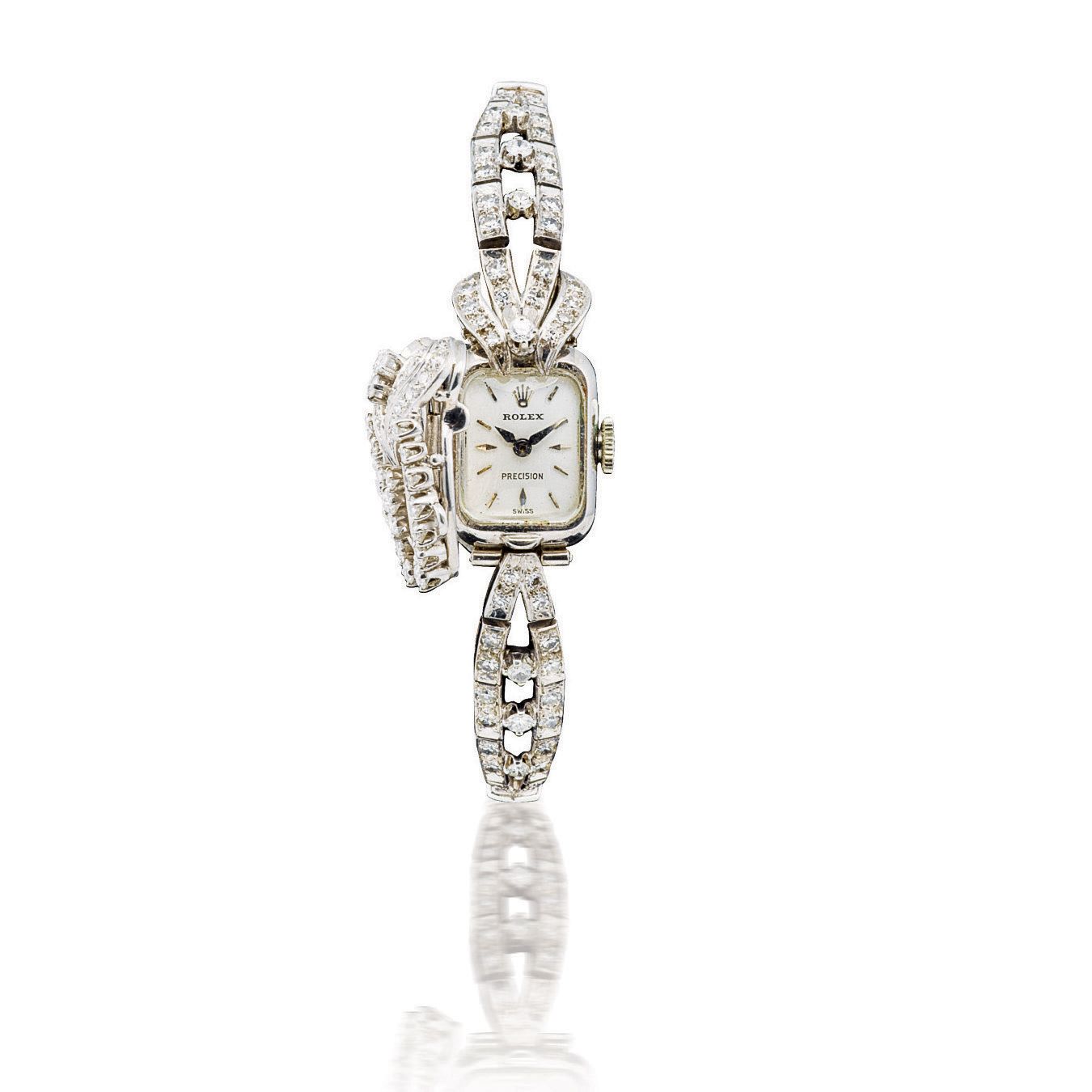 Rolex. A fine and rare 18ct white gold manual wind ladys wristwatch with diamonds