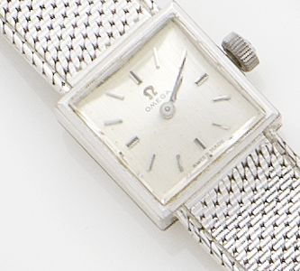 Omega. A lady's white gold manual wind bracelet watch1960's