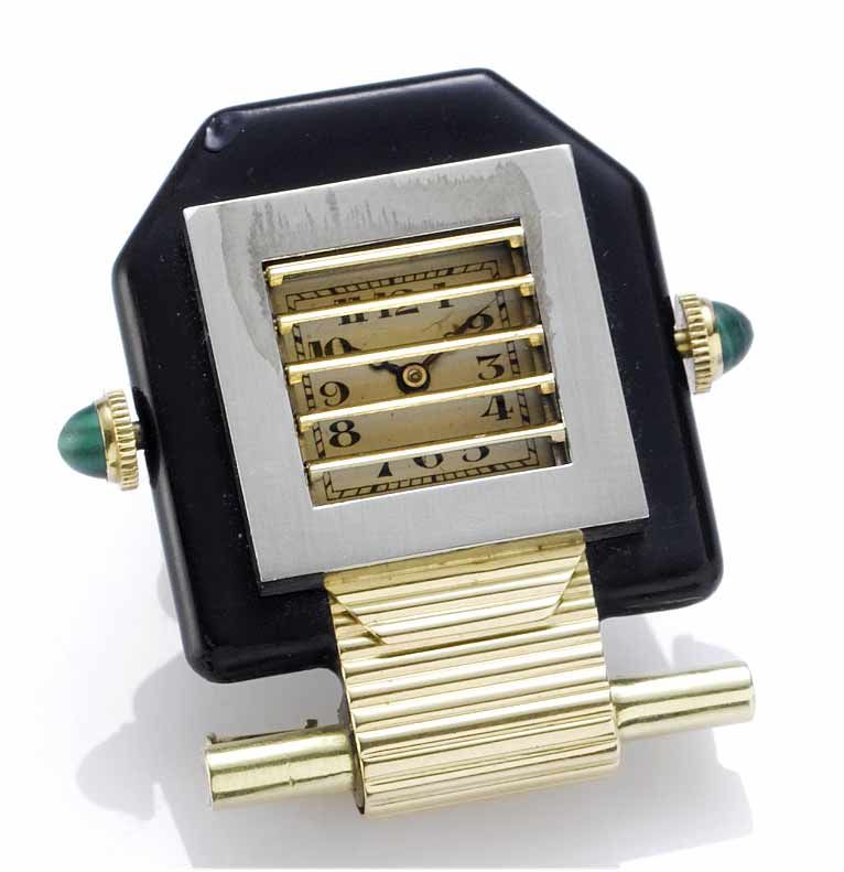 Verger Frères. A fine and rare "montre à volets" 18ct white and yellow gold, black enamel decorated brooch with concealed shutter dial Paris, 1930's, movement ...