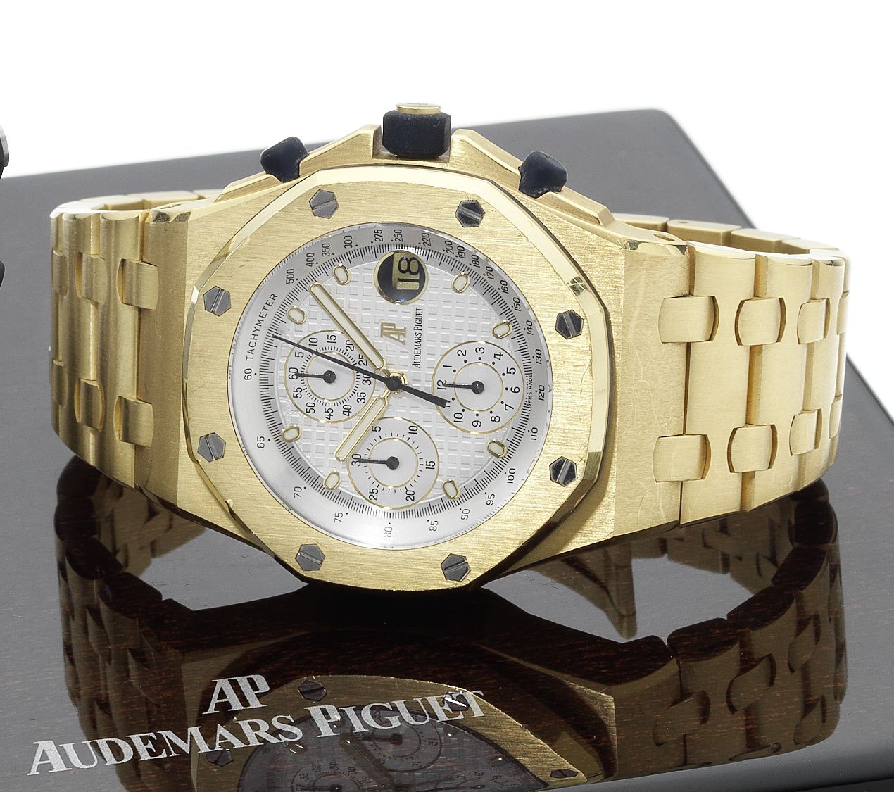 Audemars Piguet. A fine and large 18ct gold automatic chronograph calendar wristwatch with concealed double deployant clasp and fitted box & papersRoyal Oak Offshore, No.0496, ...