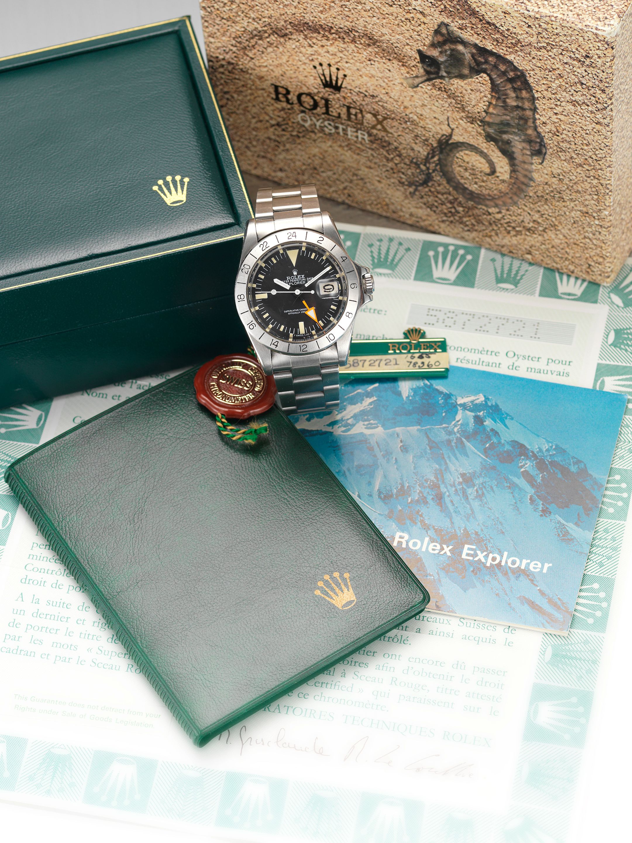 Rolex. A fine stainless steel centre seconds automatic wristwatch with 24-hour bezel and orange hand together with the original punched Guarantee papersExplorer II, Ref:1655, Case ...