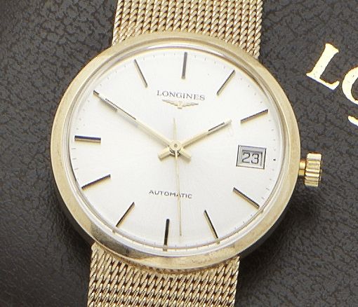 Longines. A 9ct gold automatic bracelet watch.Movement No.54137620, Case No.17306, Sold 25th May 1981