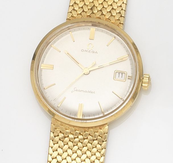 Omega. An 18ct gold manual wind calendar bracelet watchSeamaster, Circa 1960