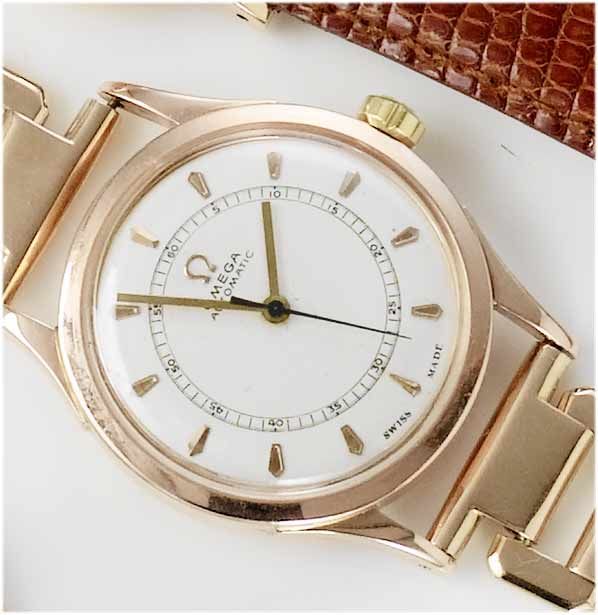 Omega. A 14ct rose gold centre seconds bracelet watch1940's