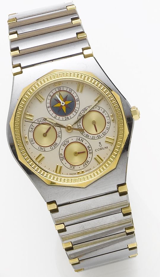 Corum. A tungsten and gold quartz calendar wristwatchAdmiral, Recent