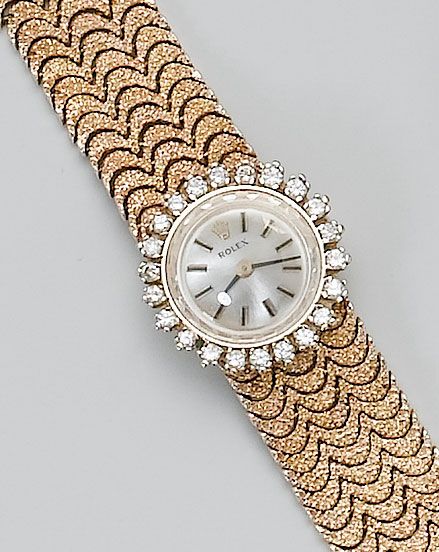 Rolex. A lady's 14ct gold diamond set bracelet watch 1960's