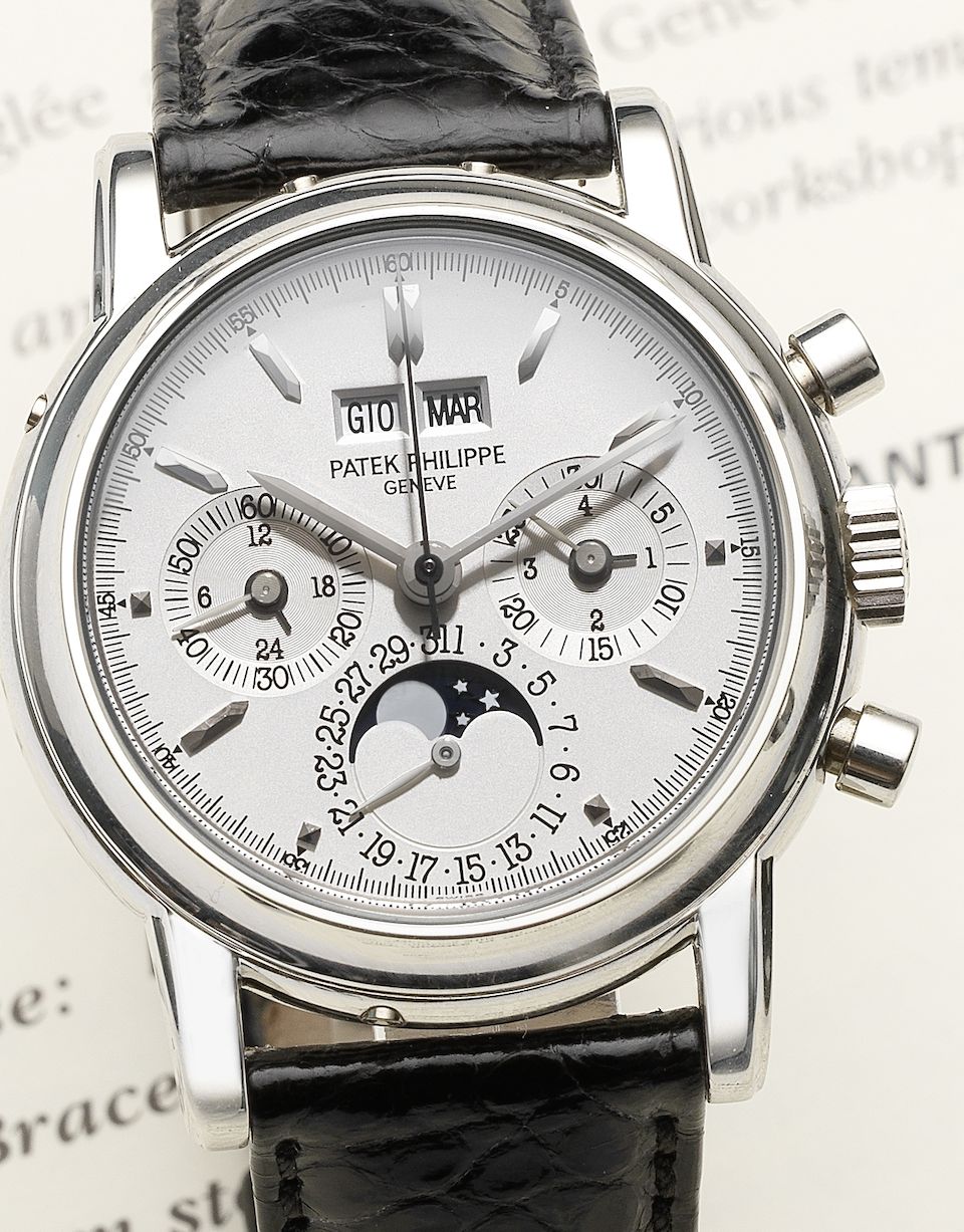 Patek Philippe. A very fine and rare platinum manual wind chronograph wristwatch with moon phases and leap year indication together with Certificate of Origin and ...