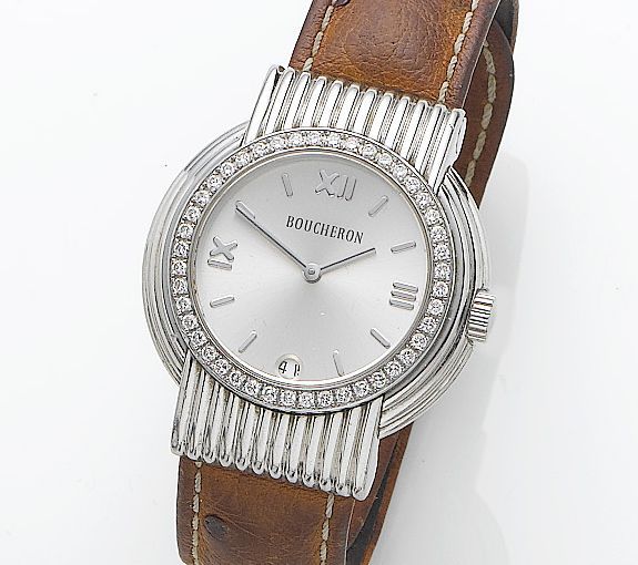 Boucheron. A lady's stainless steel diamond set calendar wristwatchRecent