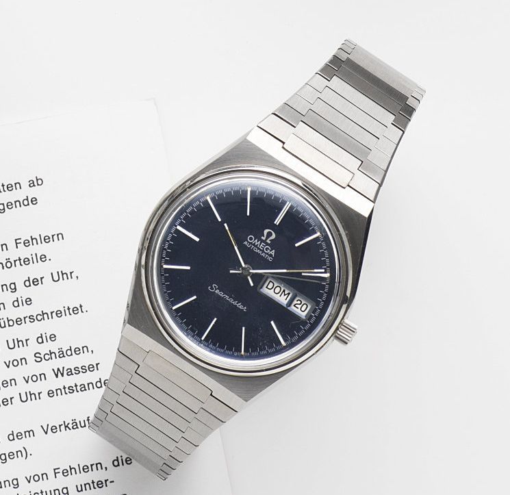 Omega. A stainless steel automatic calendar bracelet watchSeamaster Automatic, Ref:166.0215, Movement No.40918836, Sold 5th April 1985