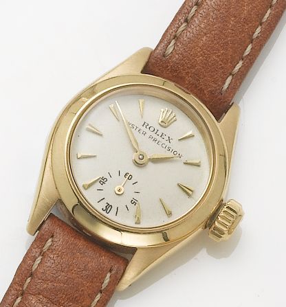 Rolex. A lady's 18ct gold wristwatch Oyster, 1950's