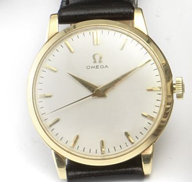 Omega. A 14ct gold manual wind centre seconds wristwatch1950's