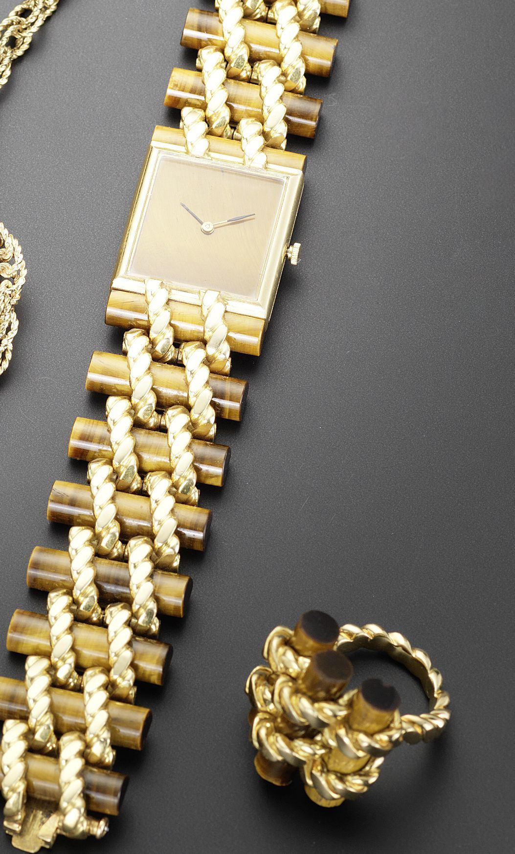 Piaget. A lady's 18ct gold and tiger's eye bracelet watch and matching ringCase made by Fred, Paris, circa 1960